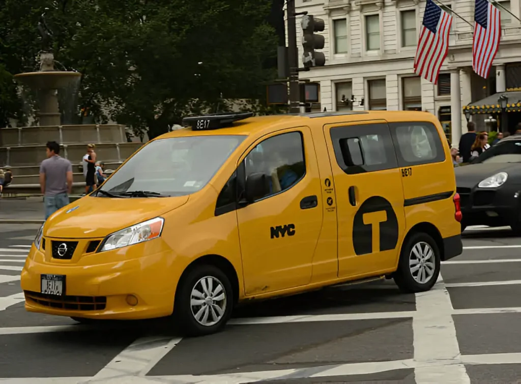 Modern wheelchair-accessible yellow taxi in NYC with deployed ramp for easy boarding