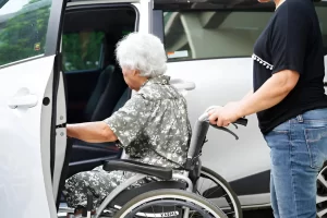 Senior enjoying a safe wheelchair transport van in NYC