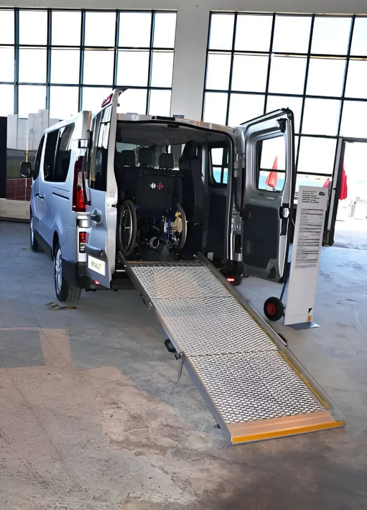 Interior of wheelchair-accessible van with safety restraints and comfortable seating