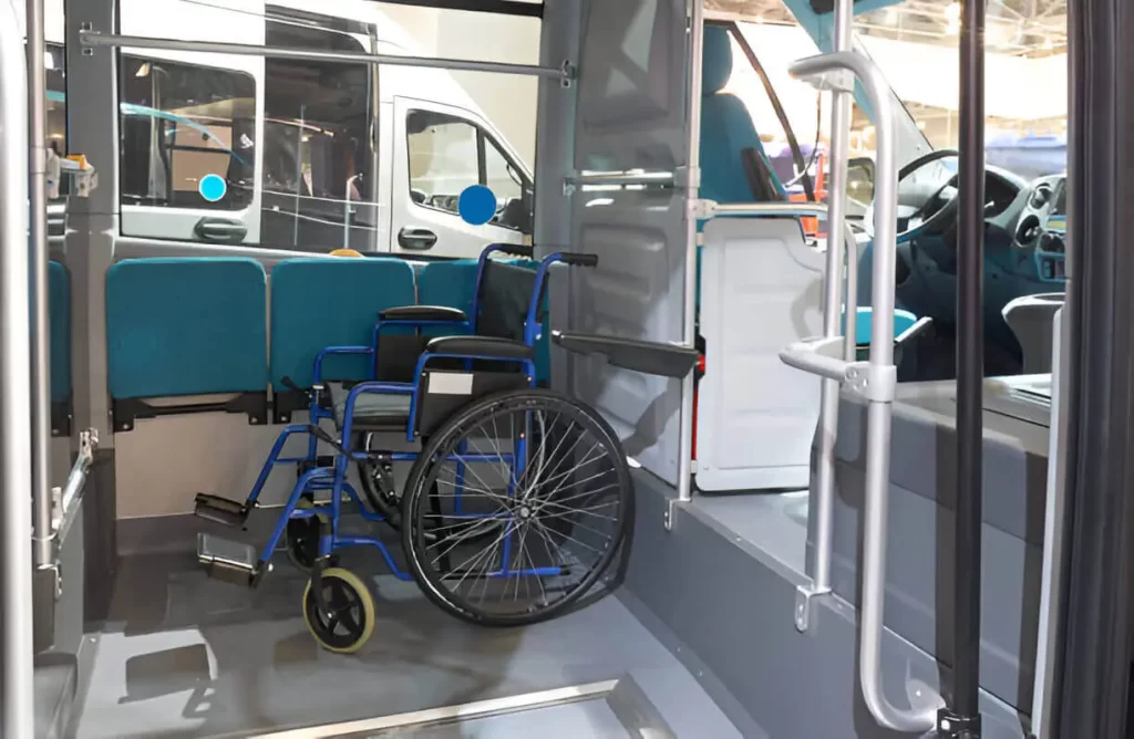 Interior view of NYC ambulette van with secured wheelchair
