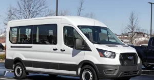 Wheelchair-accessible shuttle van parked outside a New York medical facility