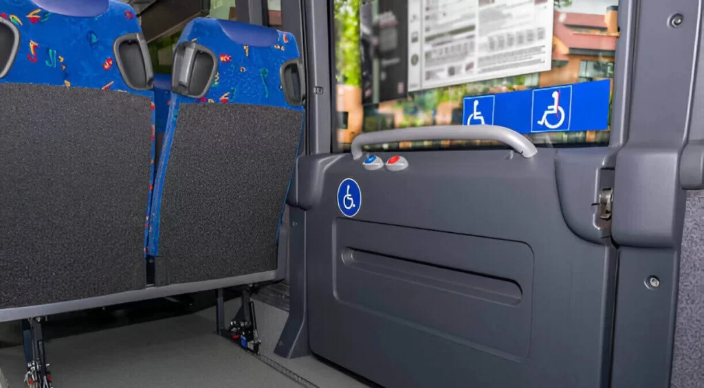 Power wheelchair secured inside a large ADA-compliant shuttle van